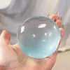 O mesmo brinquedo de óleo de coco flor de cerejeira rosa para alívio do estresse do Xiaohongshu é uma bola de descompressão moldável popular para aliviar o tédio