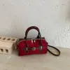 Bolso de gamuza para mujer, nuevo modelo de otoño 2026, bolso de mano de moda vintage de alta gama, bolso de hombro y cruzado para el trabajo