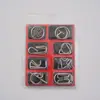 Anillo Chino Serie Nueve Entrelazados Desbloqueo y Desabrochado Juego de Ocho Piezas Venta al por Mayor Hebilla de Inteligencia Juego de 8 Piezas Hebilla Rompecabezas de Metal Abc