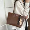 Bolso tote para mujer, moda coreana, gran capacidad, bolso casual para el hombro, patrón tejido primavera/verano 2026, bolso de hombro de nicho de moda para mujer