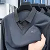 Nueva camiseta de manga larga de dos piezas falsas para primavera y otoño, de importación transfronteriza, para hombres de mediana edad, a la moda, casual, de corte holgado, con rayas y cuello, camiseta básica