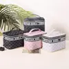 Nova Bolsa de Cosméticos Portátil Coreana Dividida Bolsa de Armazenamento Feminina Grande Capacidade Portátil de Viagem Bolsa de Cosméticos de Alto Padrão Venda por Atacado