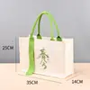 Bolsas de lona personalizadas transfronterizas con un toque de alta gama, bolsas de regalo navideñas, bolsas de lona promocionales para empresas