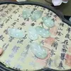 Nicho de primavera y verano, luz de lujo, jade dorado, flor de melocotón, vino, ruyi, accesorios de bloqueo, colgante de bloqueo de nube Tianshan Cui Xiang, colgante, colgante al por mayor