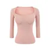 Venta al por mayor de ropa para mujer estilo europeo y americano transfronteriza INS, camiseta de manga larga ajustada con escote en forma de corazón estilo "deseo puro" con almohadillas en el pecho