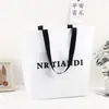Bolso Tejido Blanco Simple de Moda Personalizado Bolso de Mano de Tienda de Ropa de Marca de Diseñador Bolsa de Almacenamiento Biselada