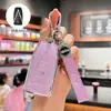 Adecuado para el estuche de llave de control remoto para automóviles Dongfeng Venucia V, VX6 y VDDi, una carcasa protectora de alta gama con una hebilla decorativa