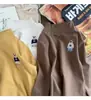Nueva camiseta de manga larga para niños y niñas, capa interior cálida de cuello medio para otoño e invierno, adecuada para bebés y niños pequeños