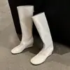 Botas de Caballero Adelgazantes para Aumentar la Altura 7cm Persona Baja Otoño/Invierno 2026 Nuevas Punta Redonda Tacón Plano Cuña Cremallera Trasera Botas Largas