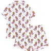 Nuevo comercio exterior transfronterizo sitio independiente de Amazon estampado de cerdito para bebé solapa leche seda doble corto pijama de mujer