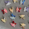 2026 Nuevo Estilo Estilo Deseo Puro Textura Translúcida de Cristal de Hielo Mariposa Uñas Portátiles Rosa y Blanco Degradado Arte de Uñas Brillante Pedrería Mayoreo