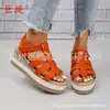 2026 Juti En Stock Venta al por mayor Primavera/Verano Nuevo Comercio exterior Tallas grandes Wish Sitio independiente Tacón de cuña Cuerda de cáñamo Sandalias de cuña para mujer