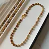 Collar de Cuentas Irregulares Facetadas Mate de Lapislázuli Retro Moda Madera Grano Piedra Hebilla Metálica Diseño Gargantilla Clavícula