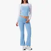Bestseller transfronterizo: Conjunto deportivo de tres piezas en bloques de color con capas, que incluye bralette, top de manga larga, cintura con doblez y pantalones acampanados para fitness casual