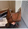 Bolso de Axila Personalizado para Mujer 2026 Nuevo Bolso de Hombro de Gamuza Otoño Vintage Bolso Cruzado Tipo Cubo para el Trabajo