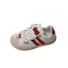 KT Zapatos de Tela para Niñas Lindos de Lunares con Concha en la Cabeza Estilo Otoño 2026 Niños Medianos y Grandes Casuales Blancos Zapatos Individuales para Niños Modernos