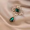 Novo broche estilo antigo de alta qualidade ins para mulheres estilo chinês leque borla pino de terno placket de pressão cheongsam corsage atacado