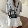 Bolso cruzado de un solo hombro de diseño único para mujer, bolso de mano simple y versátil estilo coreano, nuevo bolso de moda 2026 con lunares para el día a día