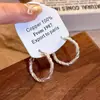 Pendientes de anillo liso exagerado con aguja de plata S925 de estilo europeo y americano para mujer, pendientes de temperamento simple Joker de lujo ligero de alta gama, venta al por mayor