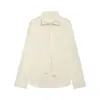 2026 Verano Nueva Moda Femenina Europea y Americana Transfronteriza Ajustada Satinada Manga Larga Camisa w101 9093