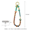 Cordón trenzado original para teléfono, nuevo estilo chino, cadena para teléfono con cuentas de sándalo estilo nacional, accesorio de nicho retro de alta gama para hombres y mujeres