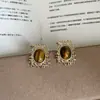 Pendientes Trenzados de Metal Geométrico con Piedra Ojo de Tigre de Gama Alta para Mujer Pendientes de Moda de Lujo Accesible Únicos de Nicho Pendientes Pendientes