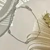 Plata de ley 925 chapada en oro de 18 quilates tres huecos lisos pequeño amor exquisito simple temperamento pequeño versátil nuevo pulsera
