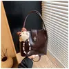 Bolsa de comercio exterior transfronteriza de la fábrica de origen, bolso de mujer, nuevo bolso de mano retro de moda 2026