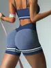 Shorts de yoga europeus e americanos sem costura em blocos de cor para mulheres, calça capri justa com efeito de levantamento de bumbum para esportes, corrida e fitness