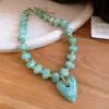Collares bohemios de cuentas europeos y americanos para mujer, cadenas para la clavícula de diseño nicho, collares de lujo ligero de alta gama para mujer al por mayor