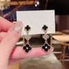 Pendientes Largos de Trébol de Cuatro Hojas Corea del Sur Temperamento de Alta Gama Súper Hada Pendientes de Celebridad de Internet Pendientes de Aguja de Plata para Mujer 2024 Nuevo