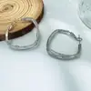 Aretes de Aro Retorcido Irregular Plateados para Mujer, Pendientes de Círculo Elegantes y con Estilo, Tachuelas y Clips para Orejas Únicos de Alta Gama al por Mayor