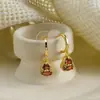 Moda Outono e Inverno Novo Estilo Chinês Brincos de Zircônia Vermelha em Forma de Cabaça Clipe de Orelha em Formato de Espiral de Mosquito Design Único Brincos Elegantes para Mulheres