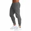 Pantalones Deportivos Europeos y Americanos para Hombre, Venta al por Mayor, Nuevos, Cruzados, Pantalones Largos de Fitness y Running para Hombre, Pantalones Casuales Ajustados de Moda