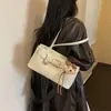 Bolso de axila de moda y súper popular para mujer 2026, nuevo modelo 2026, piel encerada plisada, bolso de mano y bolso de hombro de nicho