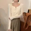 Entrega en una sola pieza otoño e invierno estilo coreano corte slim estilo francés pequeño diseño de cuello en V ropa interior de temperamento manga larga tejido base para mujer