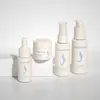 Fábrica de Origen Cuidado de la Piel Botella Pequeña Vacía Botella con Dosificador de Esencia Tarro para Crema Facial Tamaño de Viaje 50ml Botella con Atomizador Empaque para Loción