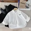Camisa de otoño para niño 2026 nuevo estilo camisa de algodón puro para primavera y otoño niños 2-3 años top de otoño moderno para niño