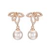 RAKOL Aretes de flor creativos simples y de moda estilo coreano de circonita para mujer temperamento exquisito micro-incrustados aretes de perlas al por mayor