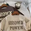Camiseta de Manga Larga de Otoño para Niños 2026 Nueva Versión Coreana Top Casual con Estampado de Letras para Niños y Niñas Cuello Redondo Camisa Base Holgada