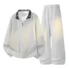 Novo conjunto casual de outono e inverno para homens, feito de algodão chinês, 320g, inclui uma blusa de moletom com meio zíper e gola virada, e calças esportivas compridas.