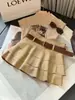 Falda de pastel de ante con volantes en capas 2026 nueva de cintura alta adelgazante versátil de línea A minifalda para chicas populares