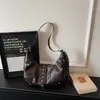 Bolso grande de mujer vintage para primavera y verano, nuevo modelo 2026, bandolera versátil para el día a día, bolso de hombro y axila de alta gama