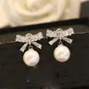 Aretes Plateados para Mujer, Estilo Coreano, Sencillos Aretes de Perlas con Lazo de Circonita