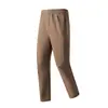 Pantalones deportivos rectos de secado rápido sin restricciones para hombre, elásticos y transpirables, adecuados para fitness al aire libre en primavera y otoño, correr y uso casual