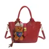 Bolso tipo bandolera cubo retro popular casual para mujer 2025 principios de otoño estilo coreano de moda versátil para ropa de trabajo bolso de hombro cruzado