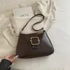 Bolso de hombro tipo baguette brillante nuevo 2026, diseño de hebilla simple y elegante, bolso de hombro de color liso, estilo coreano, versátil y elegante para ir al trabajo