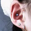Lip nail ear bone nail de venta caliente europea y americana Opal color mágico joyería de perforación comercio electrónico transfronterizo fábrica venta al por mayor en línea