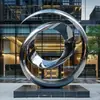 Escultura Circular Luminosa de Aço Inoxidável Superfície Espelhada Vazada Água Corrente Lua Quadrada Spray Criativo Paisagem de Porta