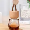 Colgante de botella de vidrio con tapa redonda pequeña de color marrón degradado con cuerda gruesa, botella de perfume popular, botella vacía, colgante para colgar en el coche, botella de aromaterapia